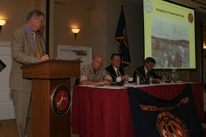 At the chapter's USMC IT Day in April, Lt. Gen. Robert Shea, USMC (Ret.) (l), moderates a three member panel: Brig. Gen. David H. Berger, USMC (2nd from l), director of plans and strategy; Dr. John Burrow (2nd from r), executive director, Marine Corps Systems Command; and James Craft, deputy C4/CIO Headquarters Marine Corps.